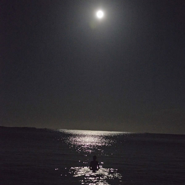 Le Petit Festival Hanko, person at full moon in sea